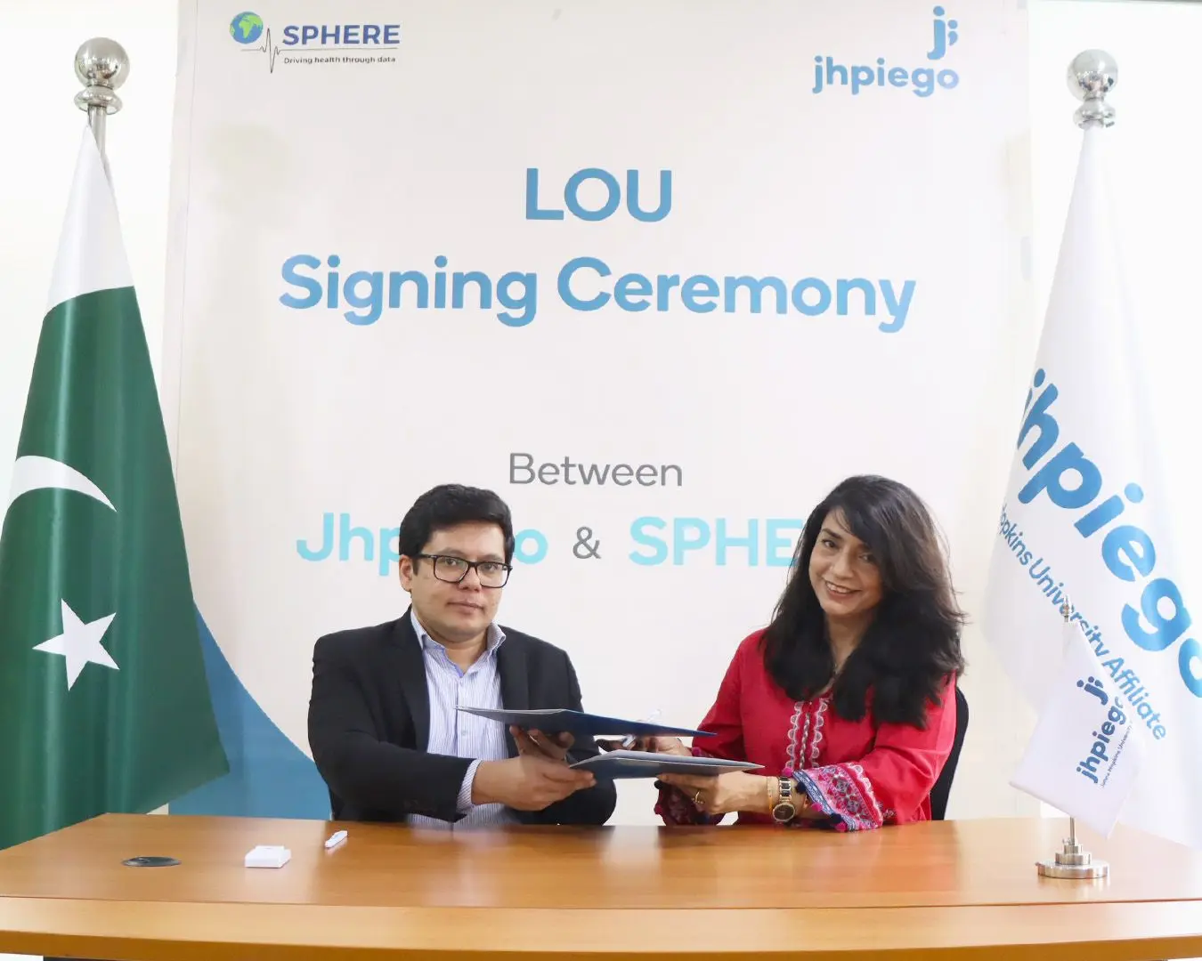 Jhpiego & SPHERE sign Letter of Understanding
